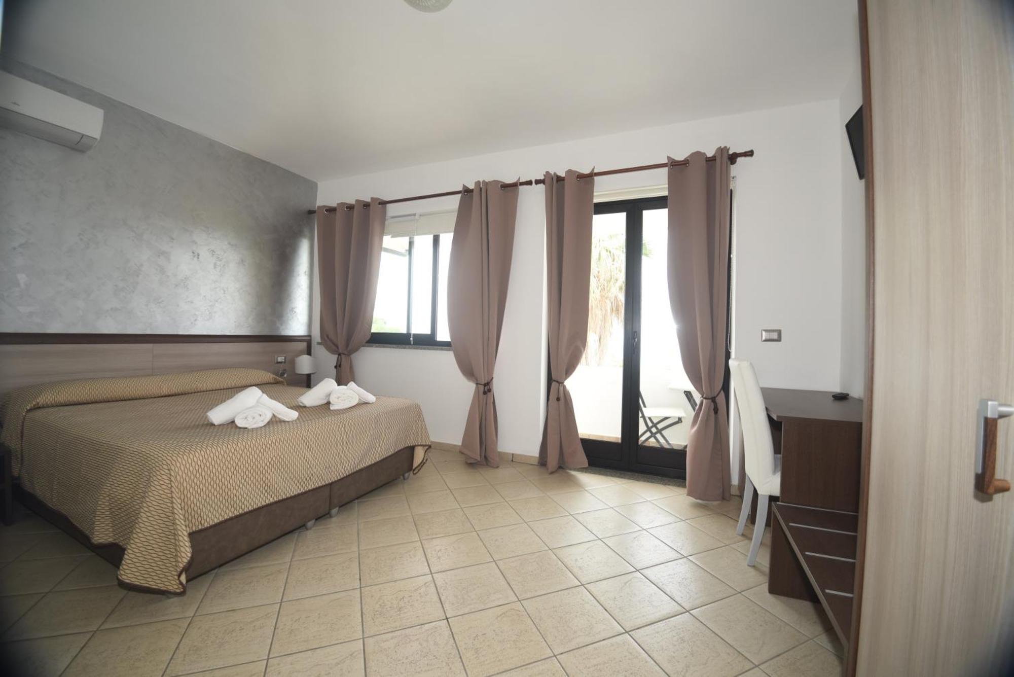 Villaggio Pineta Petto Bianco Capo Vaticano Habitación foto